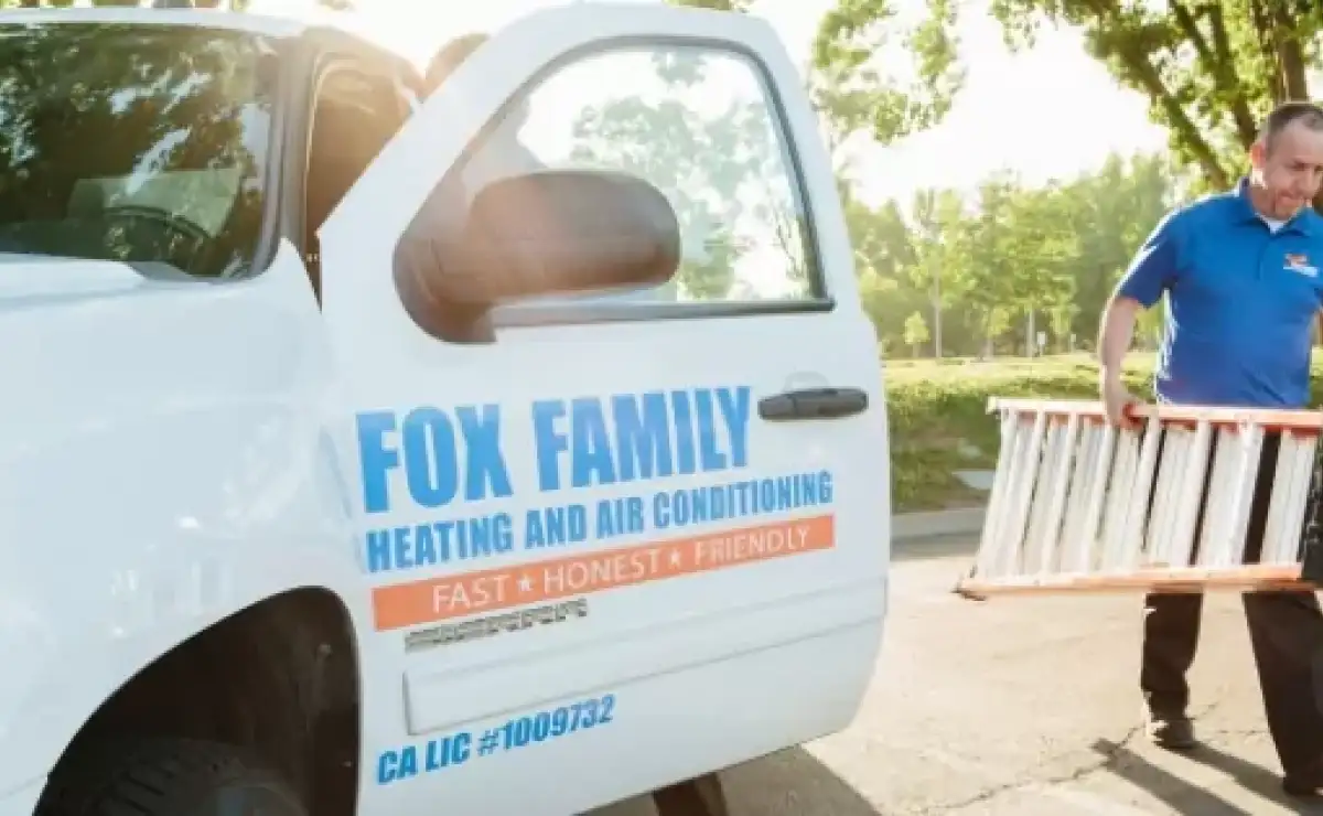 Image of an Fox Family technician repairing a furnace
