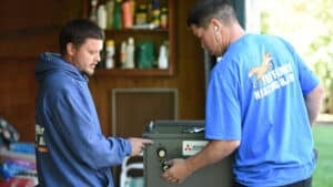 Technicians servicing an HVAC system in Sacramento.