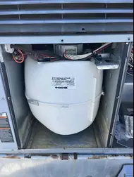 Blower motor compartment opened for airflow troubleshooting during AC service in Sacramento
